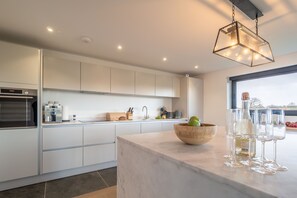 Fridge, microwave, dishwasher, coffee/tea maker