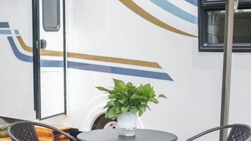 Desk, blackout drapes, rollaway beds, bed sheets