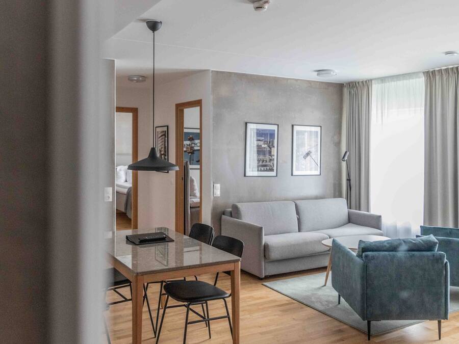 Apartemen, 2 kamar tidur | Setrika/meja setrika, Wi-Fi gratis, dan seprai linen