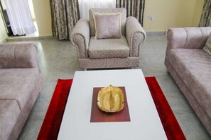 Business Apartment | Living area - Stay.Plus Milimani Luxe Apartment (Kisumu)