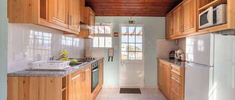 Fridge, microwave, coffee/tea maker, toaster