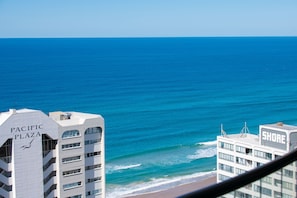 A coastal view with buildings labeled 'Pacific Plaza' and 'Shore.'