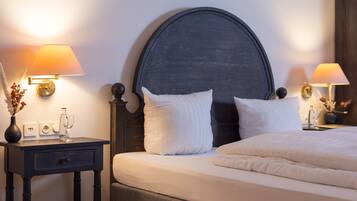 Economy Double Room | Down comforters, minibar, desk, laptop workspace