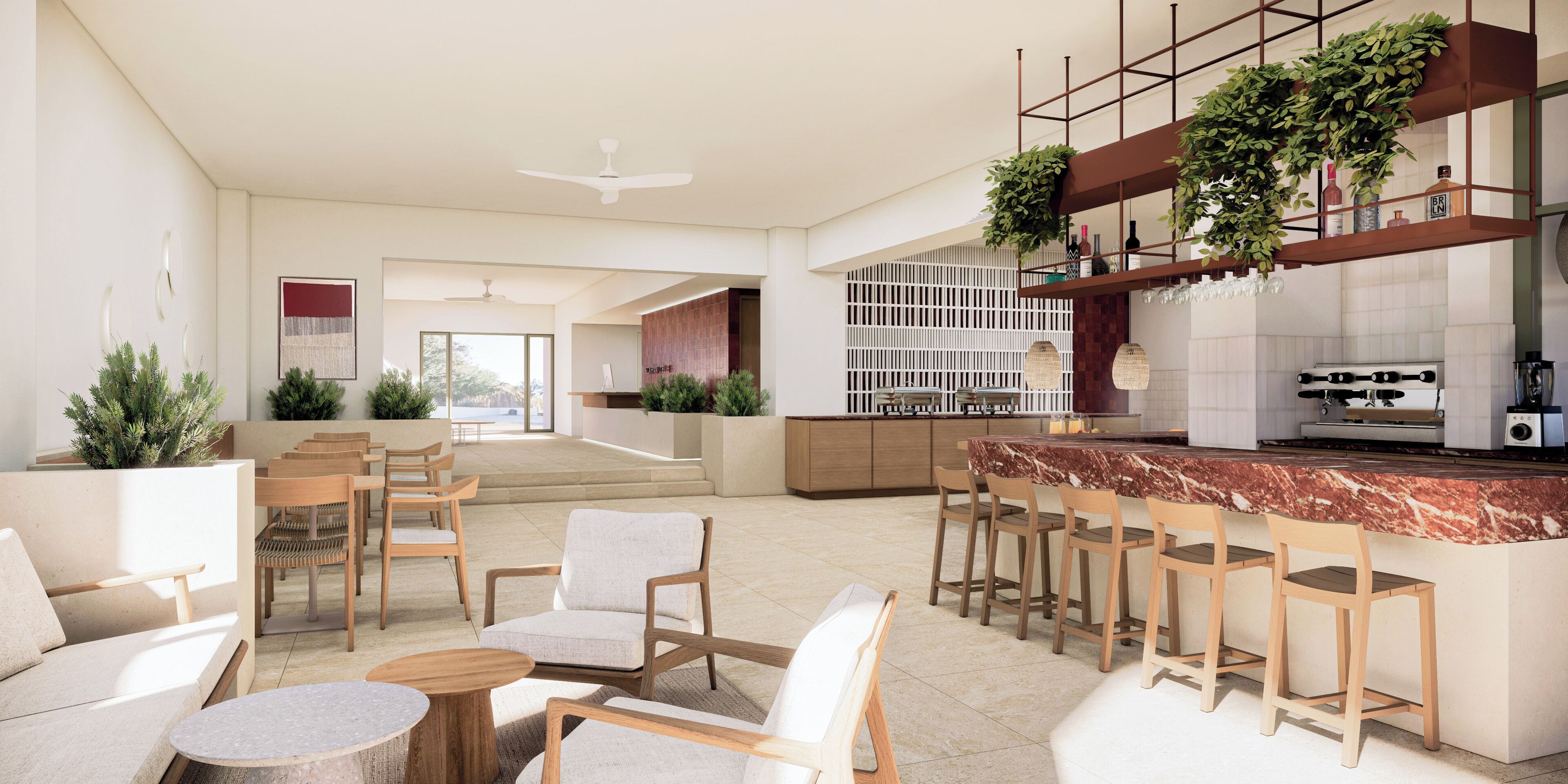 Et moderne interiør med barområde, siddepladser og en trappe op til en etage.