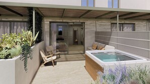A modern outdoor area with a hot tub, seating, and planters. - Cavo Marelia (Karpathos)