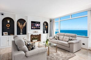 Presidential Penthouse, 2 Bedrooms, Sea View, Beachfront | Living area | 55-inch Smart TV with satellite channels, TV