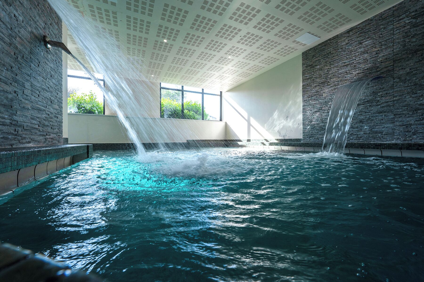 Indoor pool, outdoor pool, pool umbrellas, sun loungers