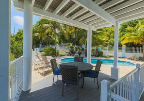 Outdoor dining - Cliffside at Cane Bay - 3 bed/ 4 bath seaside home with private pool. (Cane Bay beach)