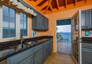 Fridge, microwave, oven, stovetop - Cliffside at Cane Bay - 3 bed/ 4 bath seaside home with private pool. (Cane Bay beach)