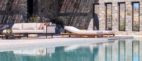 Seasonal outdoor pool, pool umbrellas, pool loungers