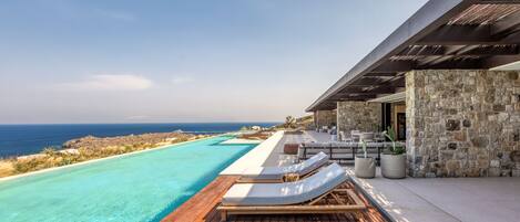 Seasonal outdoor pool, pool umbrellas, sun loungers