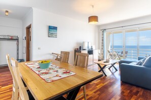 Standard Apartment | Living area | Flat-screen TV