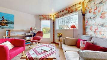 Télévision, cheminée, lecteur de DVD