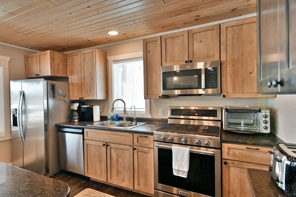 Fridge, microwave, dishwasher, coffee/tea maker