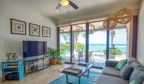 Smart TV - Elegant ground level beachfront condo with pool access, AC and WiFi! (Akumal)