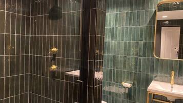 Bathtub, hair dryer, towels