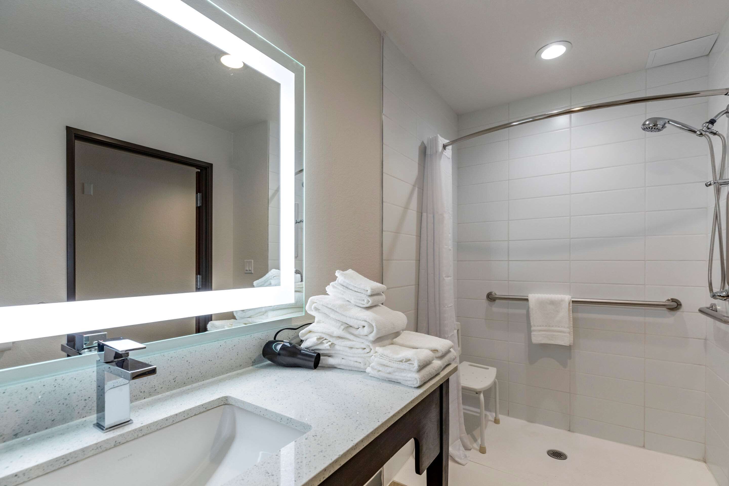 desk, laptop workspace, blackout curtains, iron/ironing board