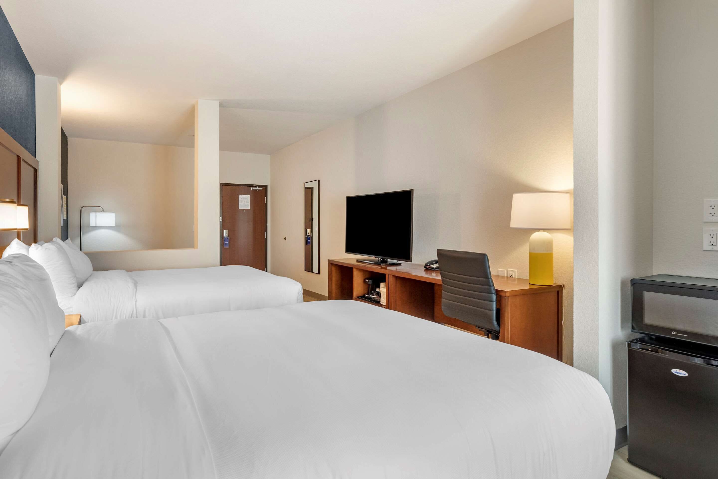 suite, 2 queen beds, non smoking | desk, laptop workspace, blackout curtains, iron/ironing board