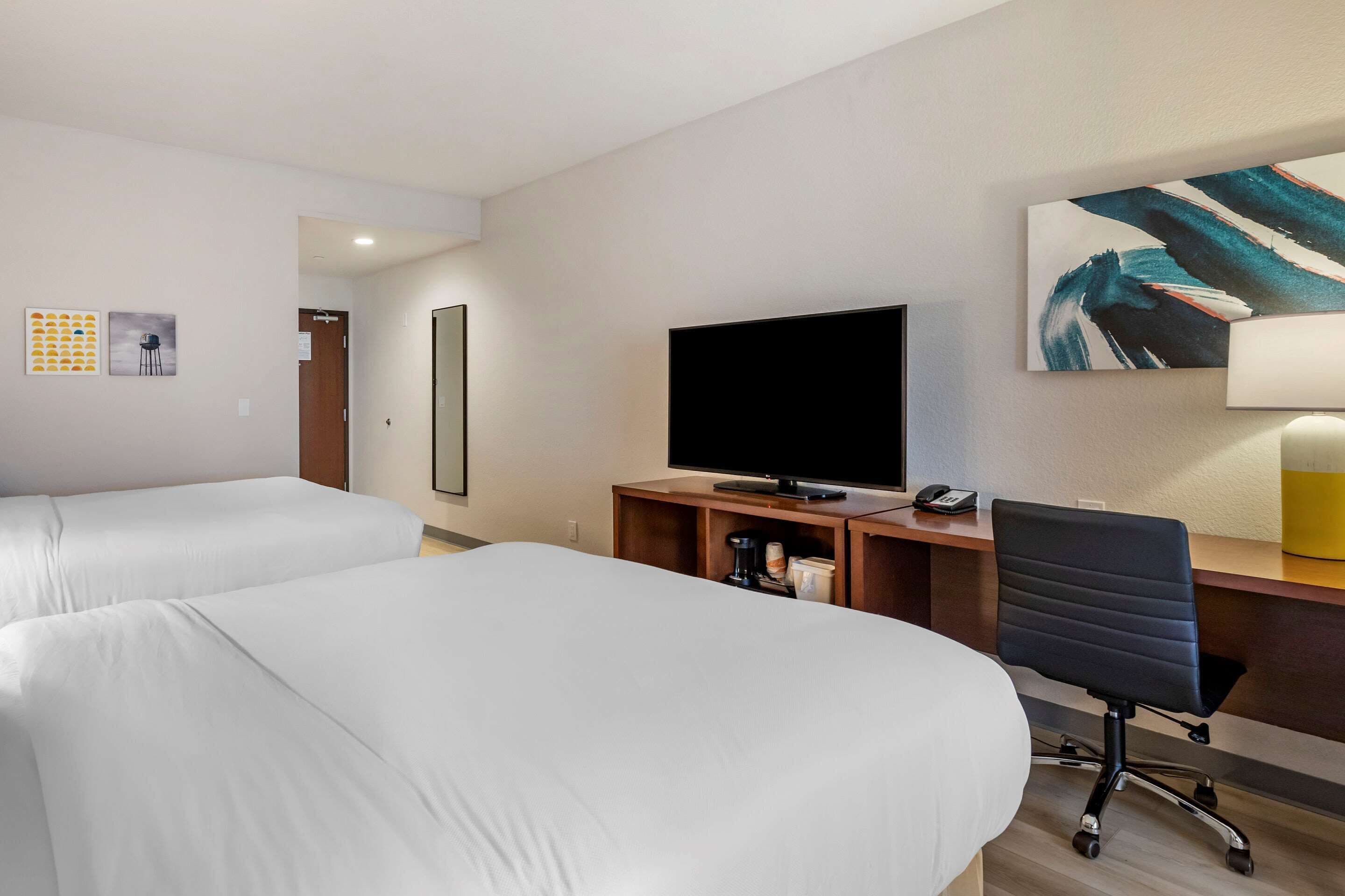 standard room, 2 queen beds, non smoking | desk, laptop workspace, blackout curtains, iron/ironing board