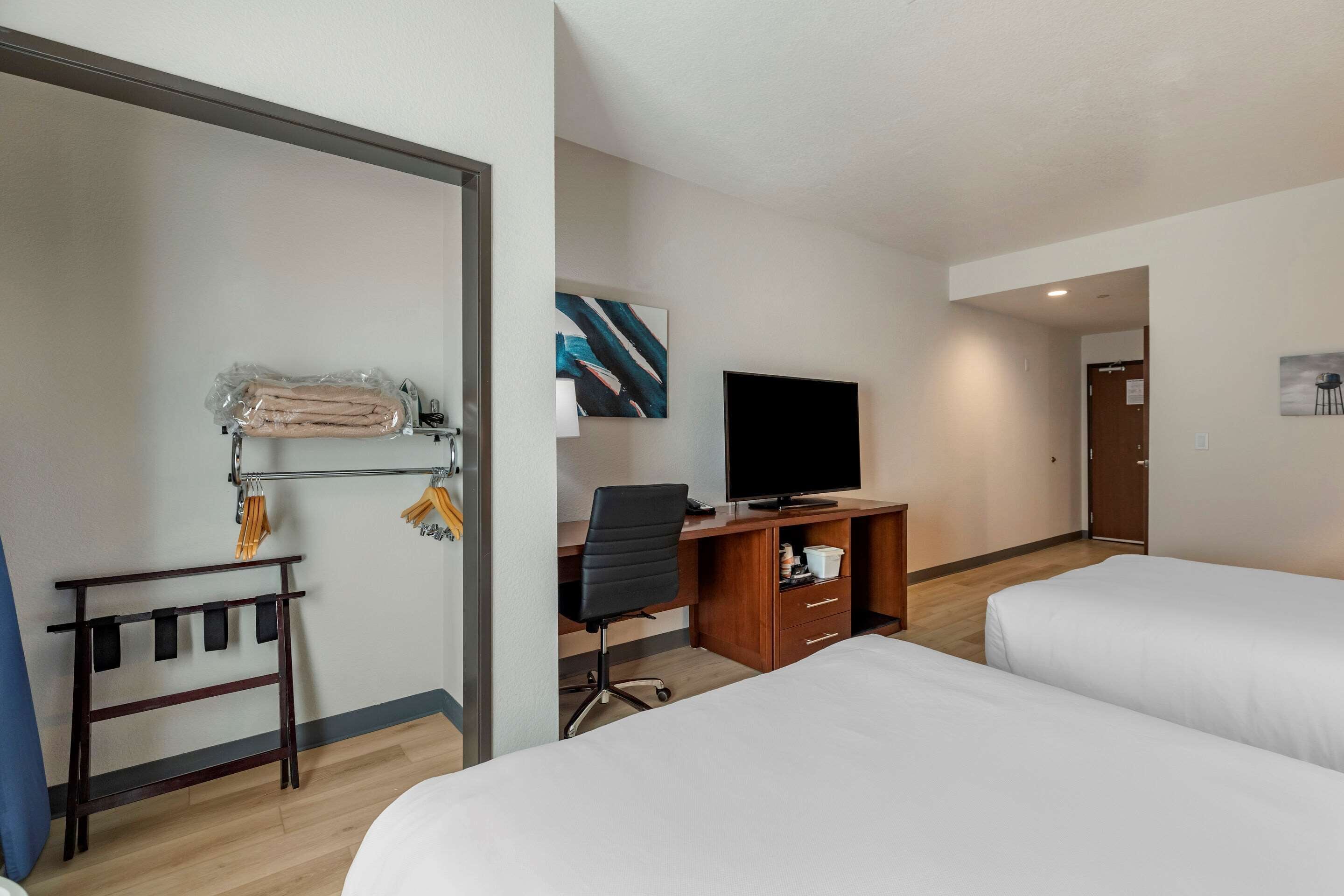 desk, laptop workspace, blackout curtains, iron/ironing board