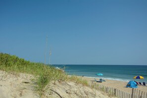 Relax on the beach with a serene ocean view.