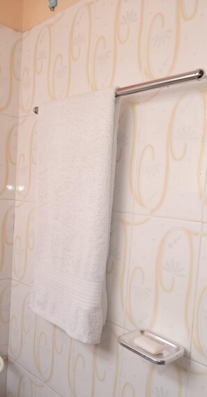 Economy Studio | Bathroom | Shower, free toiletries, bidet, towels - Stay.Plus TRM Deluxe Apartments (Nairobi)
