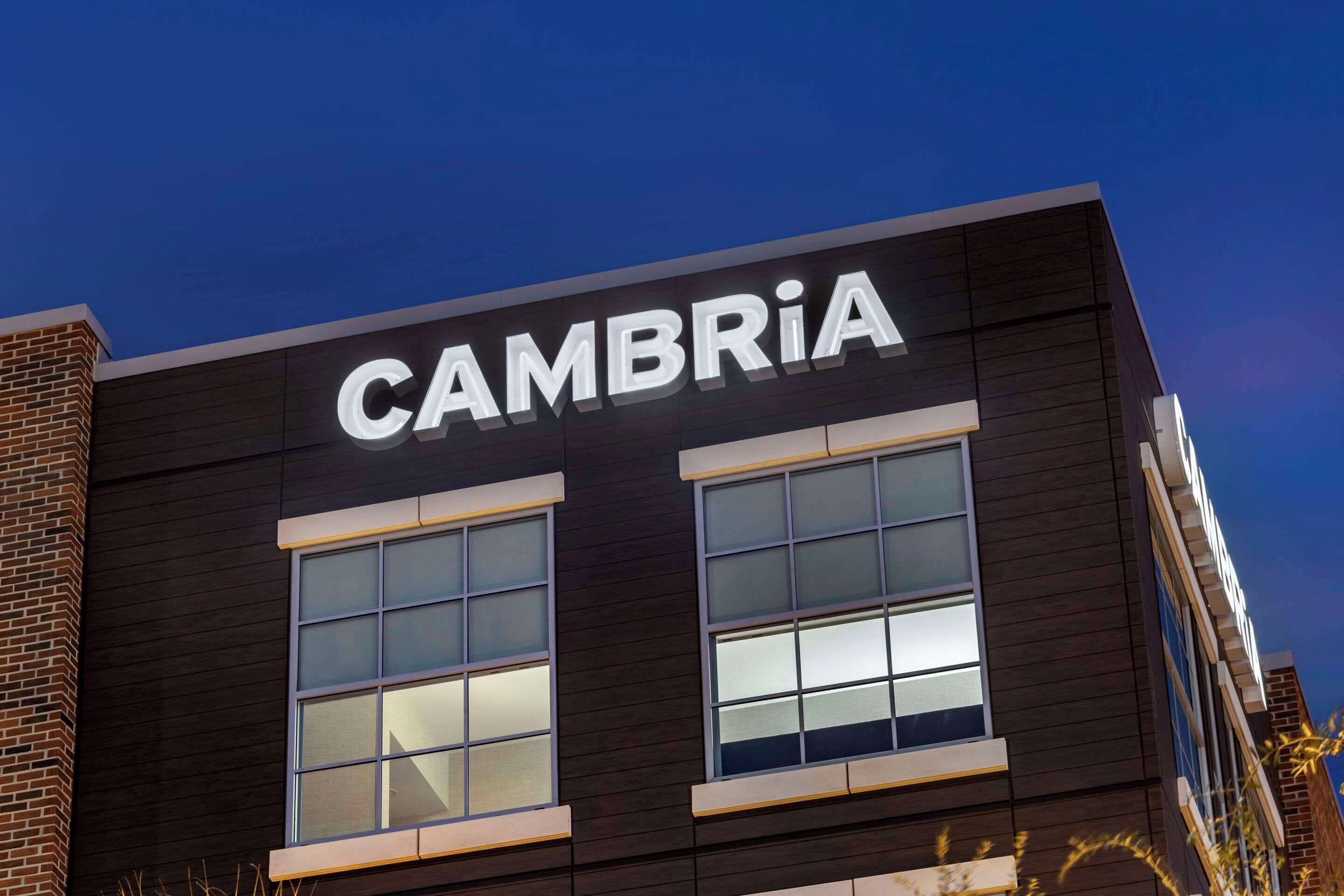 A building with the name "CAMBRIA" prominently displayed on its facade.
