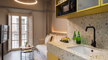 Classic Studio | Private kitchen | Full-size fridge, microwave, stovetop, coffee/tea maker