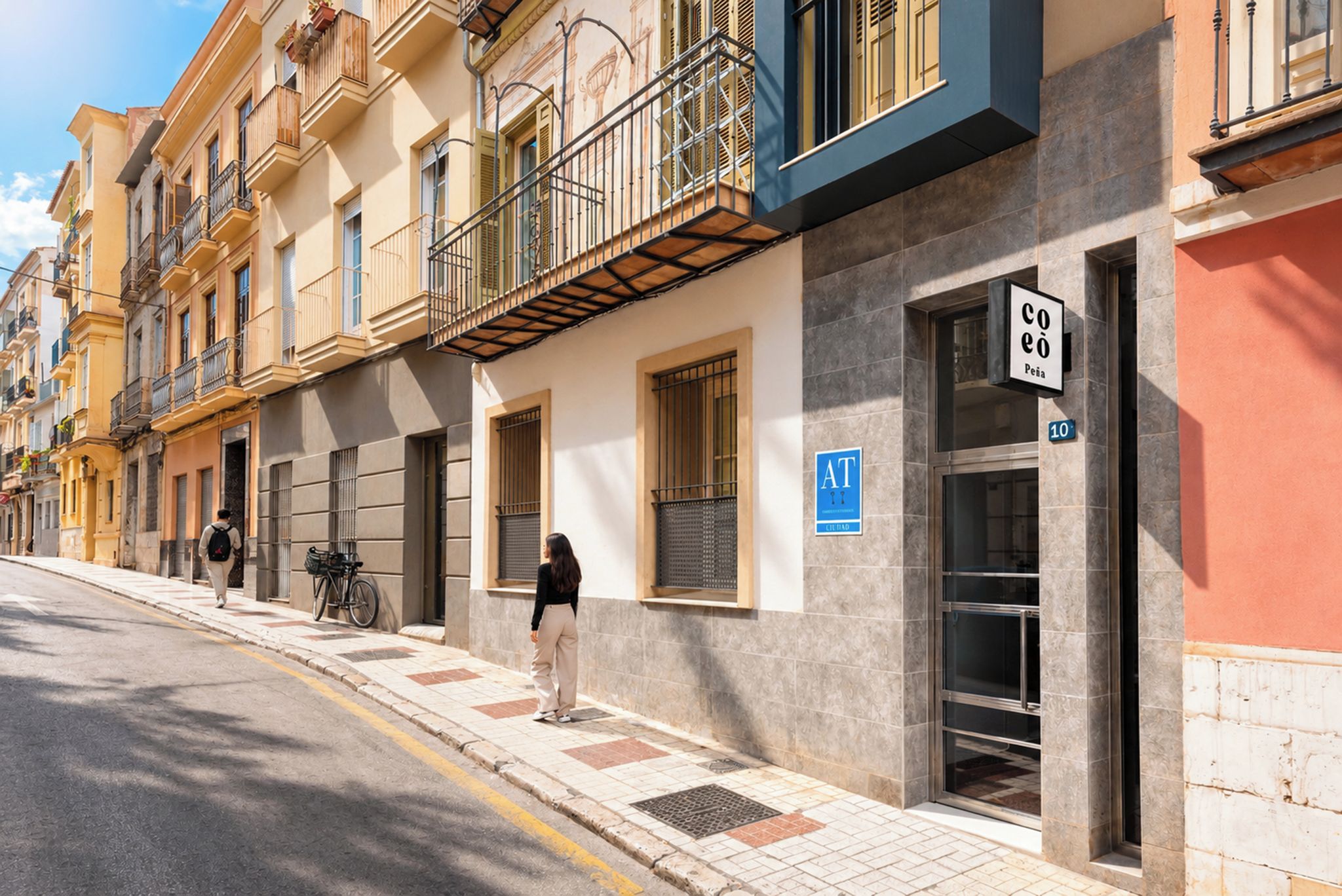 A street view of a building with a visible AT sign, indicating a business or commercial area.