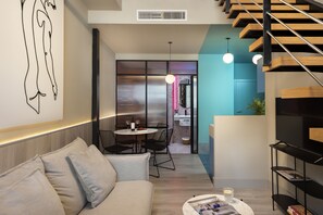 都會複式房屋, 1 間臥室, 露台, 城市景 | 客廳 | 平面電視