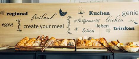 A wooden board with various German words and phrases, accompanied by a display of bread and baskets.