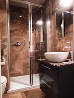 Shower, free toiletries, hair dryer, bathrobes