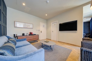 Executive Room | Living area | Flat-screen TV