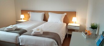 Central Suites Arouca com estacionamento gratuito