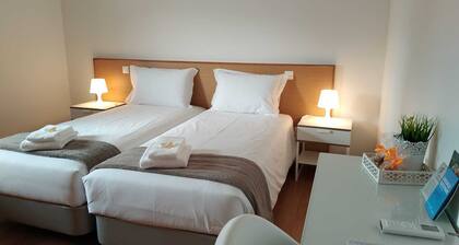 Central Suites Arouca com estacionamento gratuito