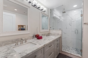 Combined shower/tub, hair dryer, towels, soap