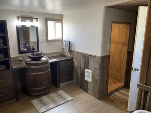 Bathtub, hair dryer, towels, soap