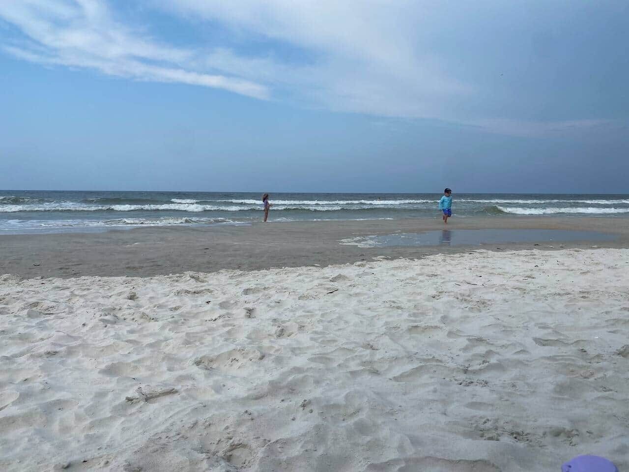 On the beach, sun loungers, beach towels