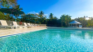 4 outdoor pools, open 8:00 AM to 7:00 PM, pool umbrellas