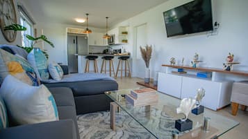 Comfort Villa, Balcony, Garden View | Living area | 32-inch Smart TV with cable channels, TV