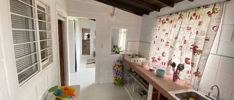 Fridge, blender, cookware/dishes/utensils, dining tables