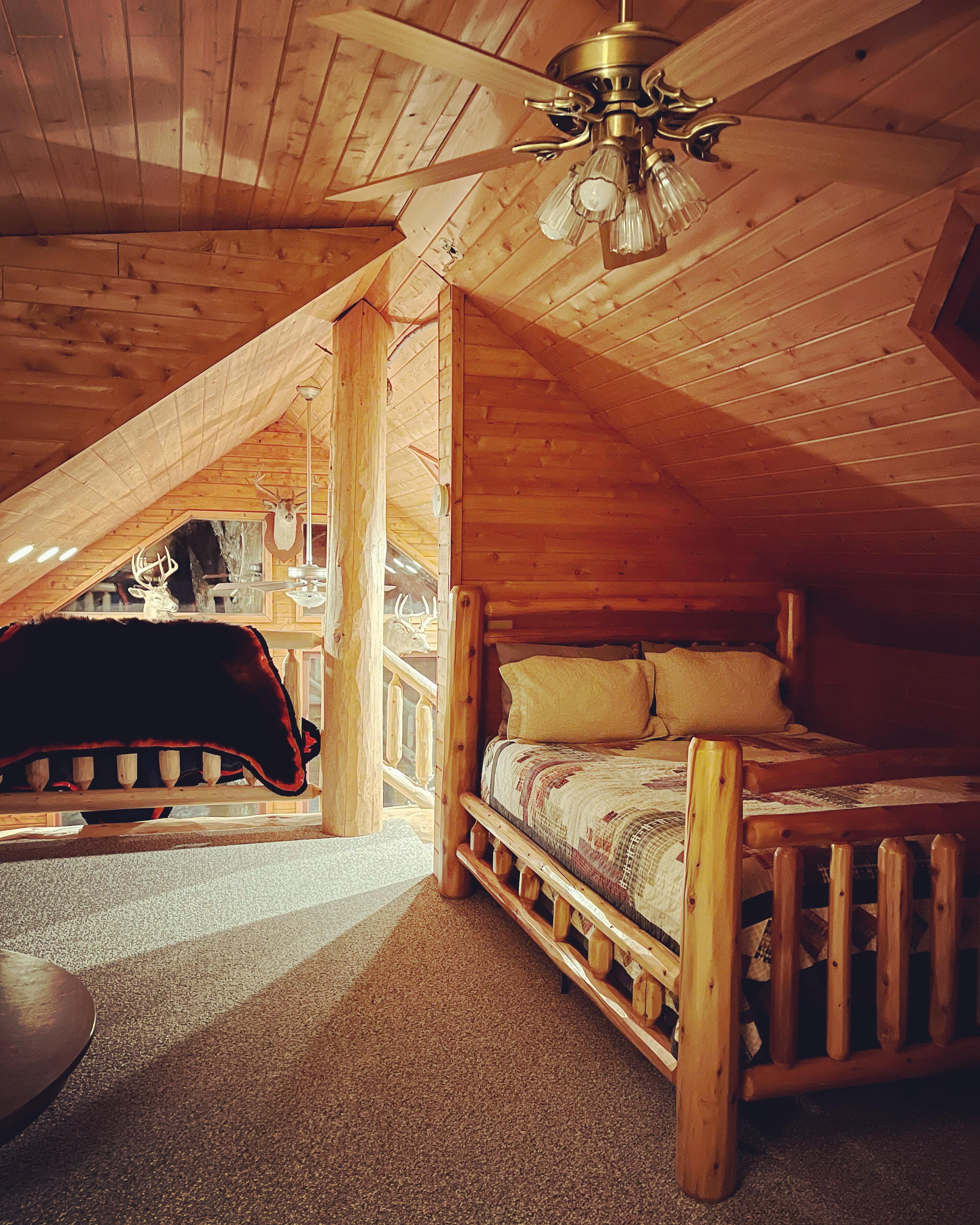 Stunning, secluded lodge nestled in the woods- minutes from town.