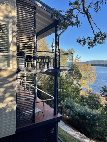 Absolute lake front - lie in bed & listen to the fish jump!