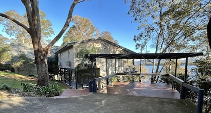 Absolute lake front - lie in bed & listen to the fish jump!