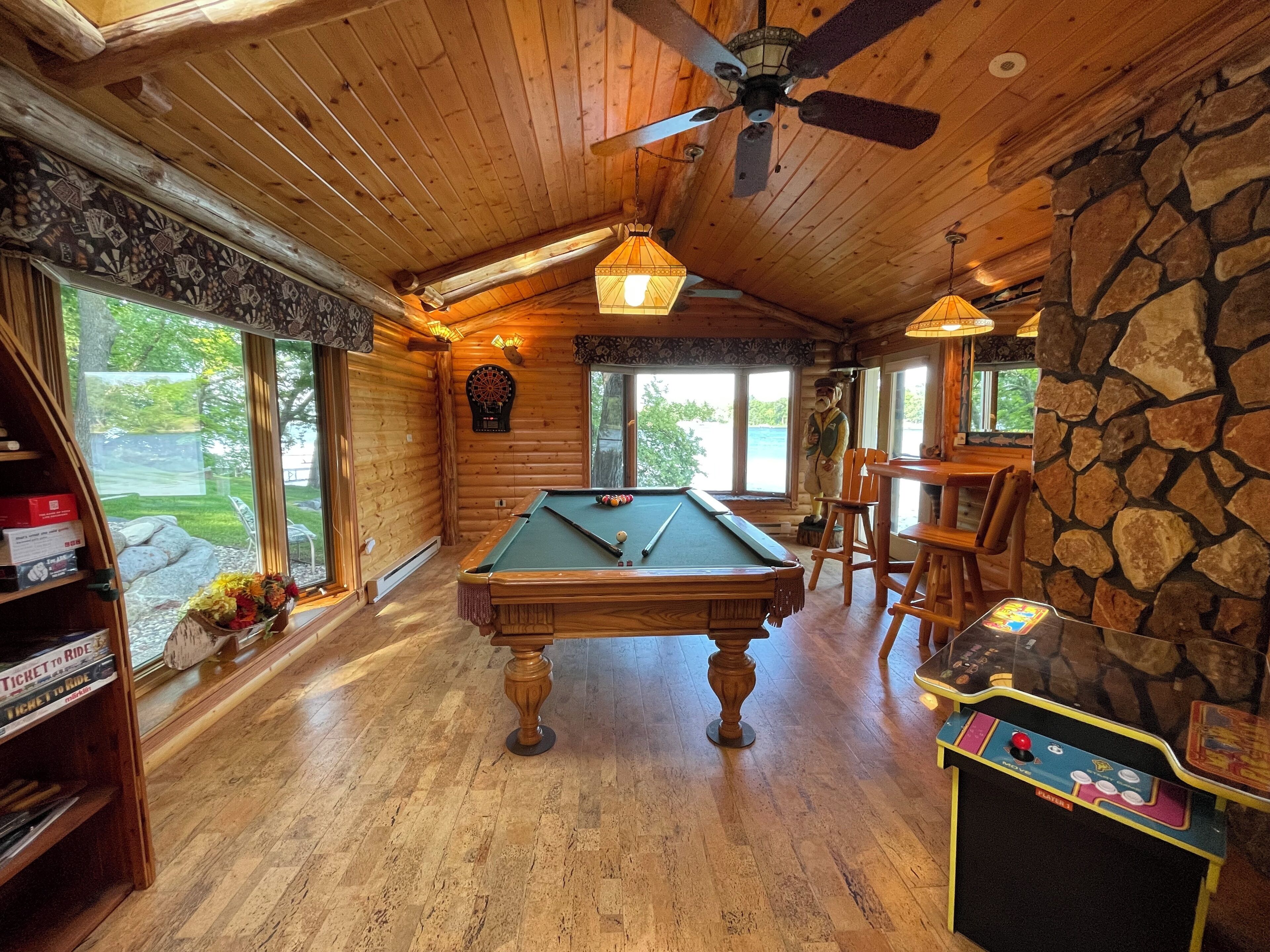 Pool table, old school video game, darts, and many other games.