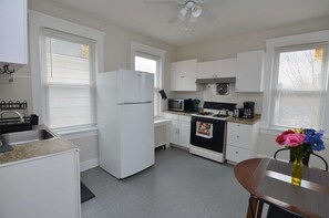Fridge, microwave, oven, stovetop - Spacious 2-Family w/ Parking & Laundry Near RU/RWJ (Highland Park)