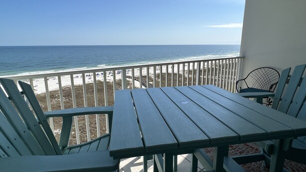 A balcony with a view of the beach and ocean. - Newly Remodeled, Beachfront Condo, Sleeps Six, Resort Amenities! (Orange Beach)
