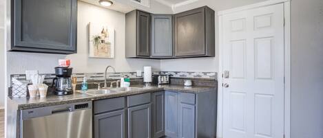 Coffee/tea maker, fridge, microwave, oven