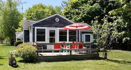 In the narrows on Lake Leelanau, pet friendly, sleeps 8, and a dock!