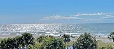 On the beach, sun loungers